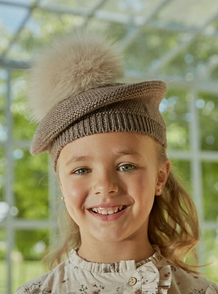 Brown knitted beret with fur pompom. One size