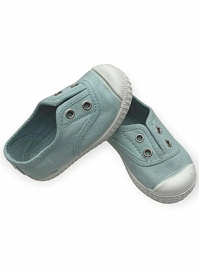 Canvas shoe with aqua green toe. Unisex