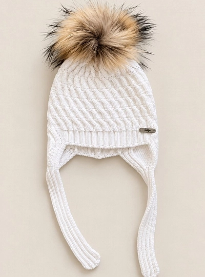 Children's cable-knit hat with earflaps and a natural fur pom-pom.