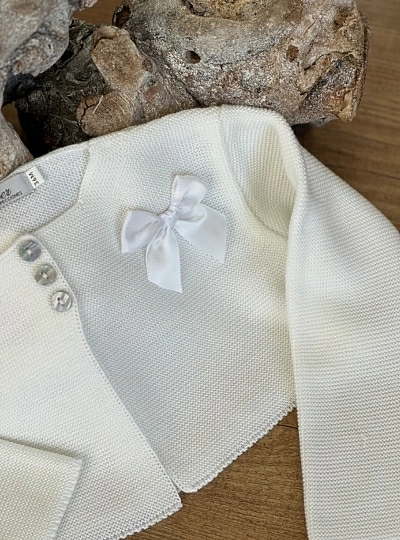 Girl's jacket in fine yarn, three colors with matching bow.