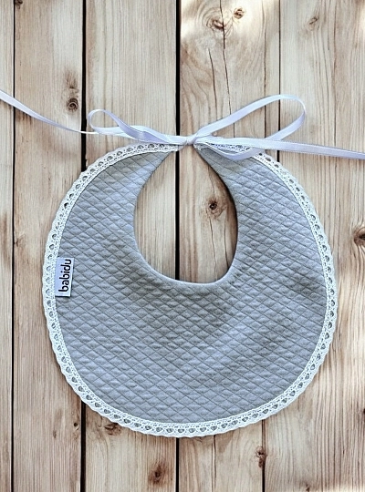 Round piqué bib London collection