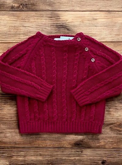 Two-tone boy's sweater. Cable knit.