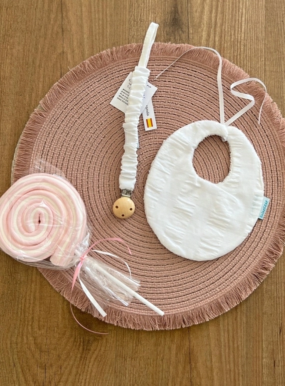 White muslin bib and pacifier pack