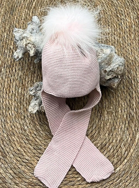 Wool hat with pom pom and scarf attached to the hat